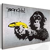 murando - Bilder Banksy Monkey with Banana Gun 120x80 cm Vlies Leinwandbild 1 tlg Kunstdruck modern Wandbilder XXL Wanddekoration Design Wand Bild Affe mit bananen Pistole G